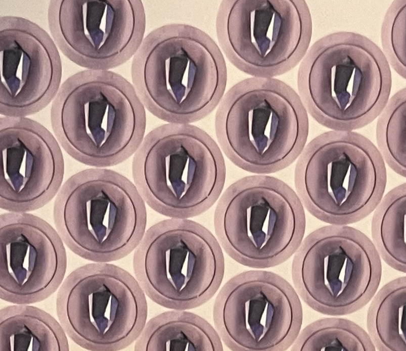 cardboard game pieces with picture of a purple crystal